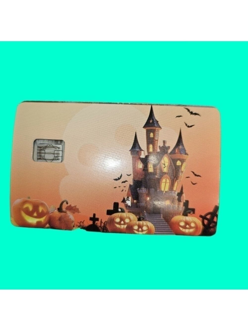 Haunted house with pumpkins credit card skin for small chip cards
